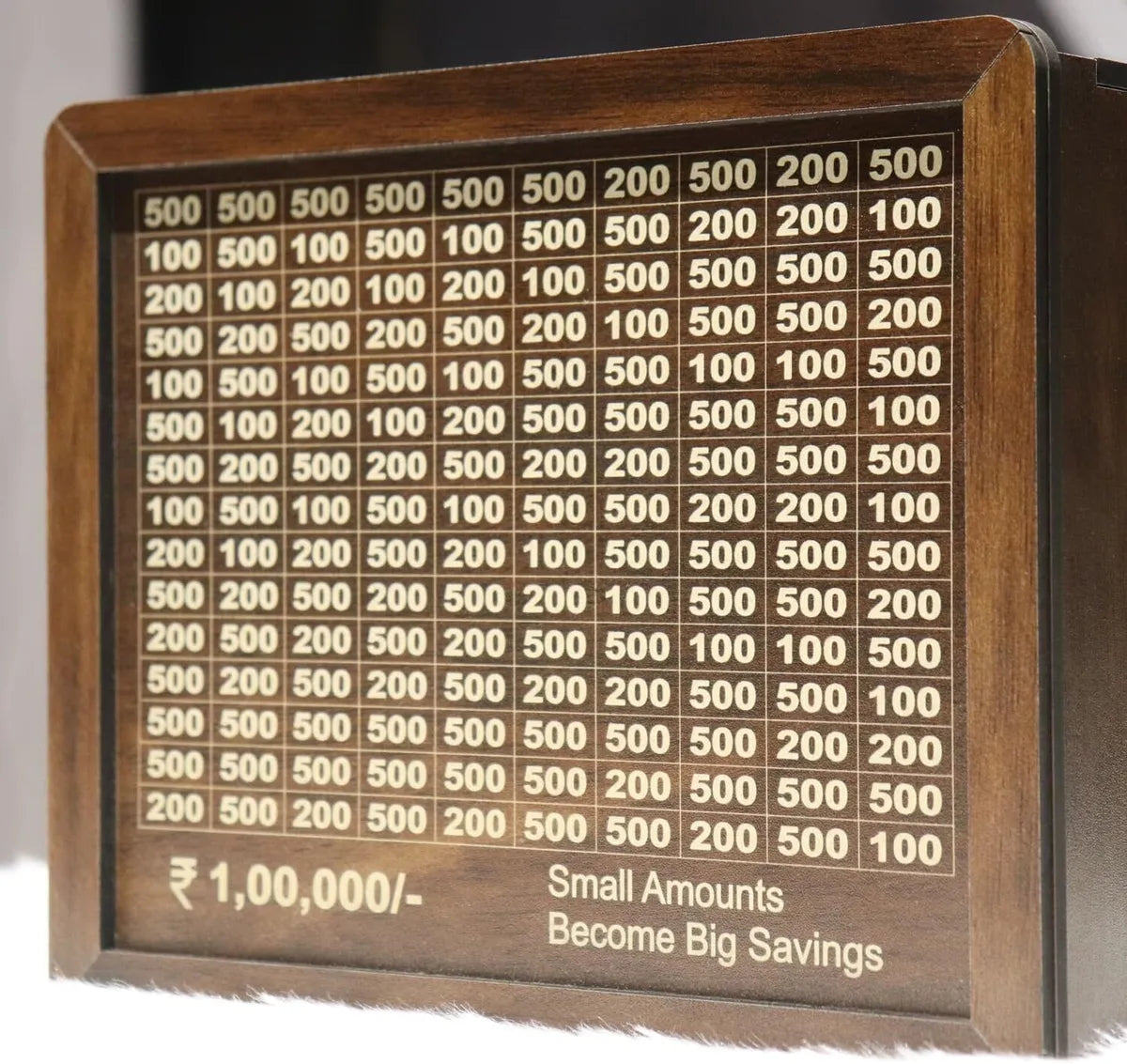 Wooden daily savings bank with chart for Rs 100000